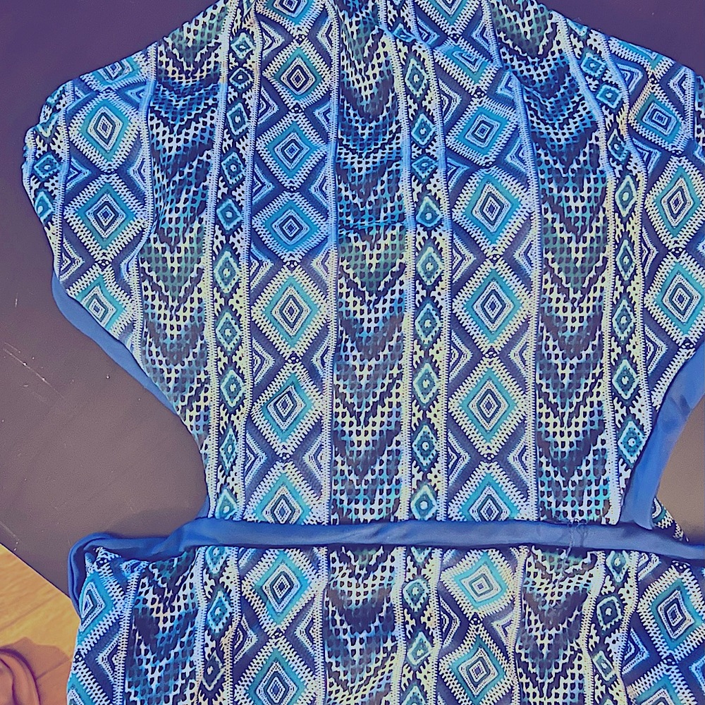 Womens One piece goes around the neckline blue and mix of others size XL